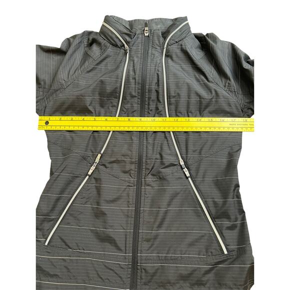 ATHLETA Run On Windbreaker Jacket Hidden Hood Reflective Stripes Size XS - Picture 10 of 10